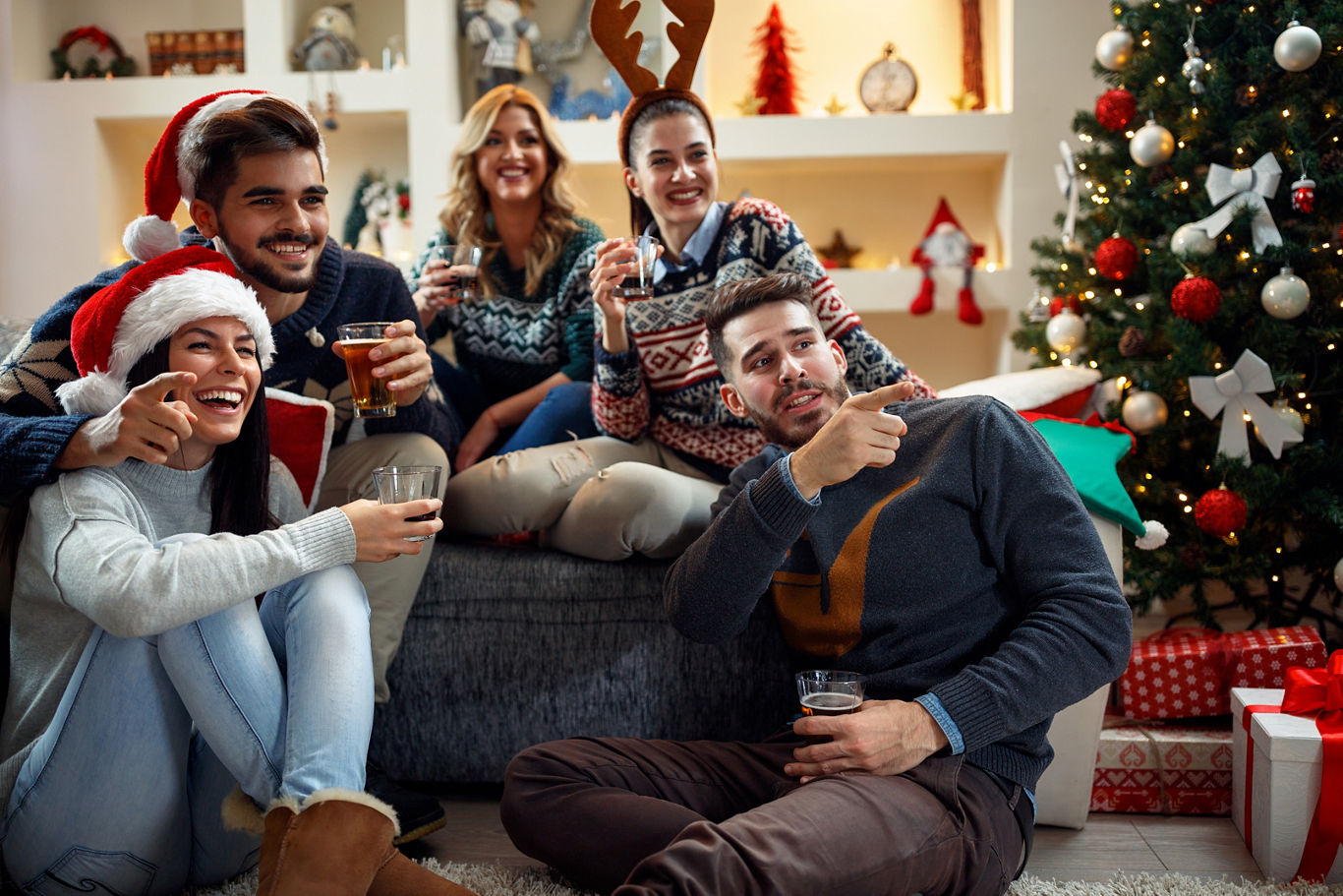 Friends Enjoying Christmas Movies Surrounded By Holiday Décor | Blog | Greystar 